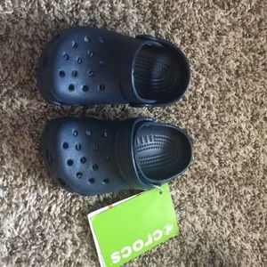 Crocs toddler boys shoe.